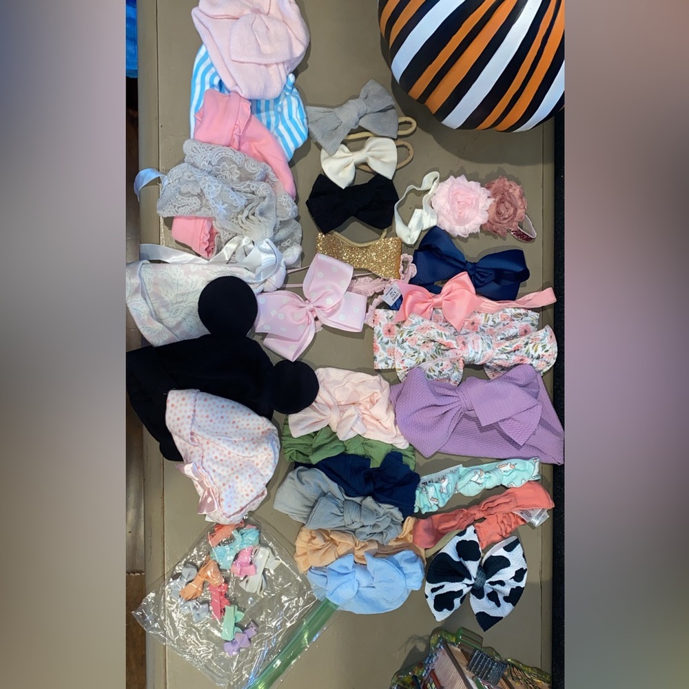 Bundle of baby headband boys, hats, and clips